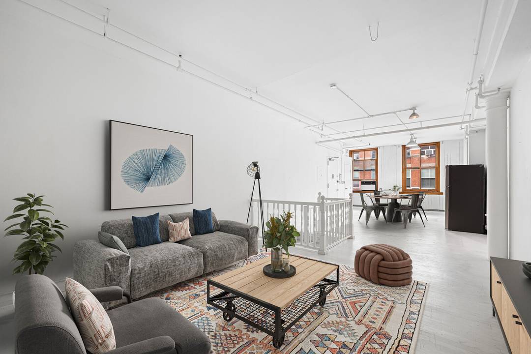 Flooded with natural light through oversized western facing windows, this 1, 200 sq ft duplex loft offers an open, flexible layout across two levels with endless possibilities for living, dining, ...