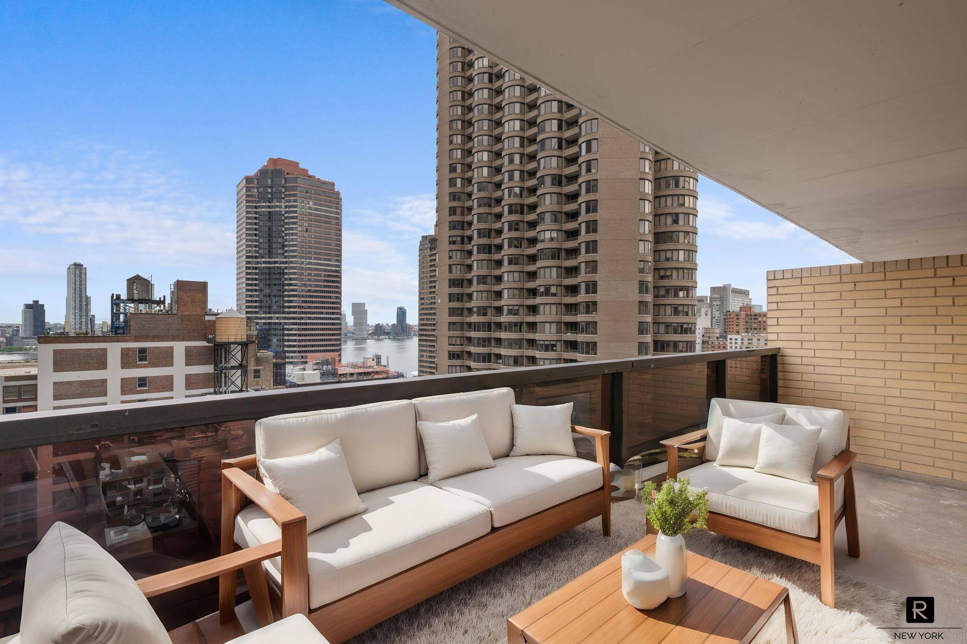 Immerse yourself in luxury living at The Whitney Condominium in this one bedroom apartment featuring a spacious private terrace boasting East River views.