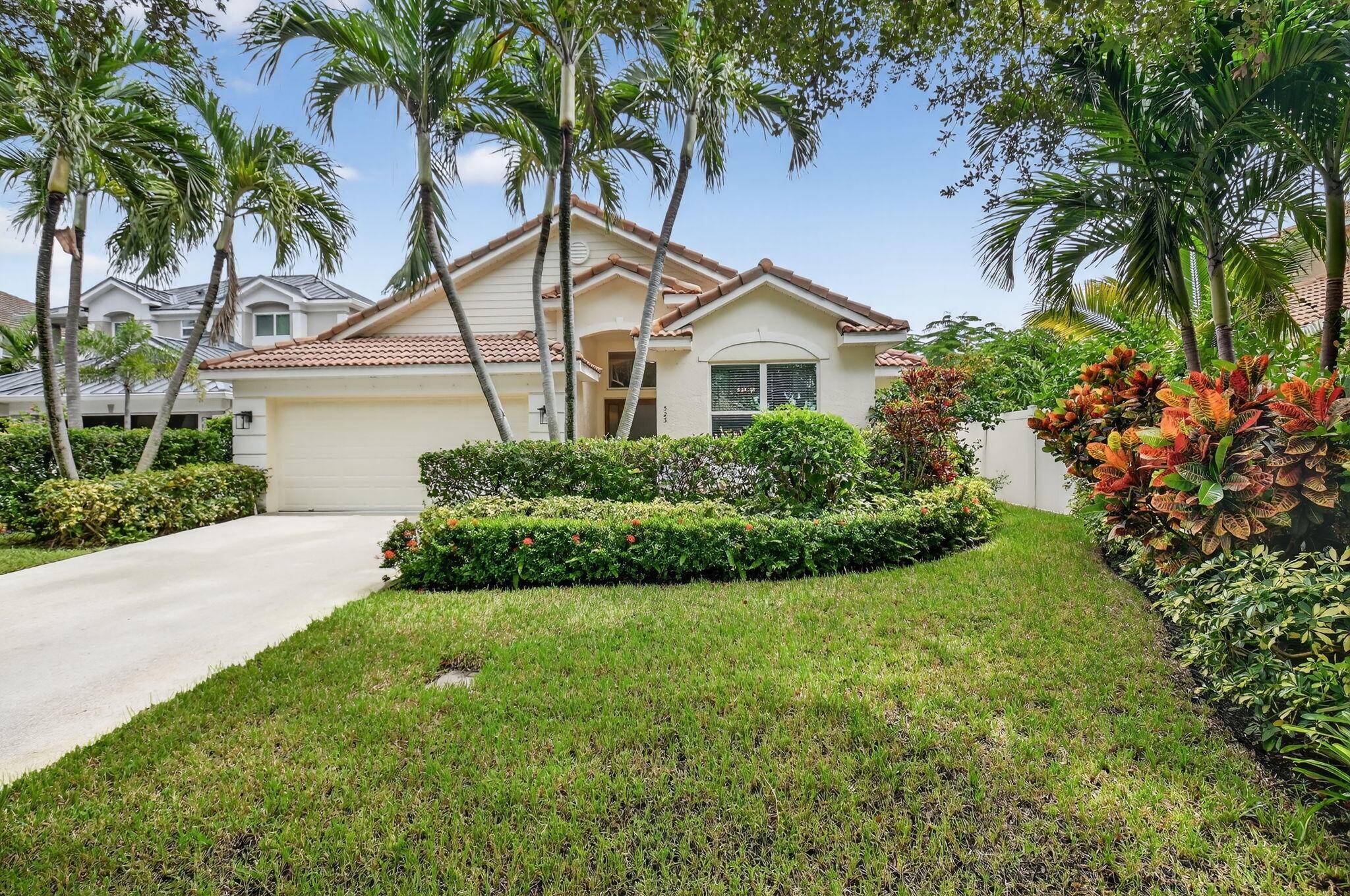 Welcome to this beautifully updated waterfront home located in the gated enclave of Delray Lakes one of East Delray's most desirable and rare single family communities east of I 95.