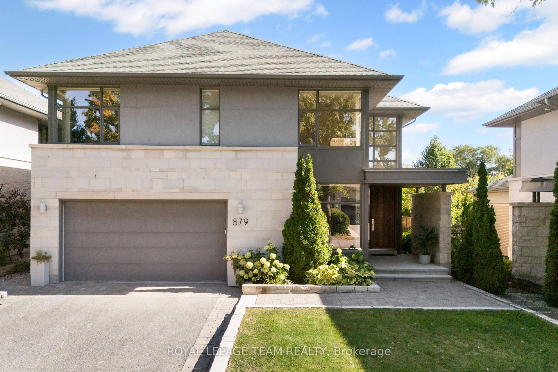 Custom built by Roca Homes and designed by Barry Hobin, 879 Winnington Avenue is a rare executive residence in the award winning Whitehaven Collection.
