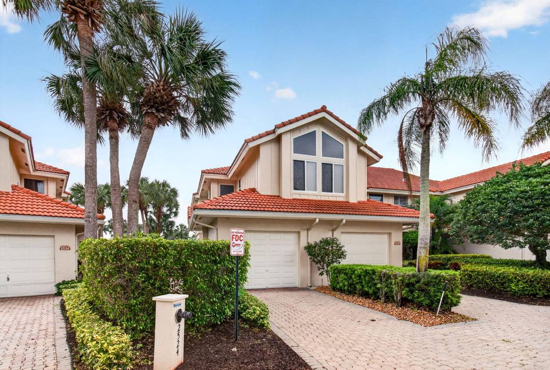 Experience elevated living in this fully remodeled penthouse residence located in the prestigious Broken Sound Country Club.