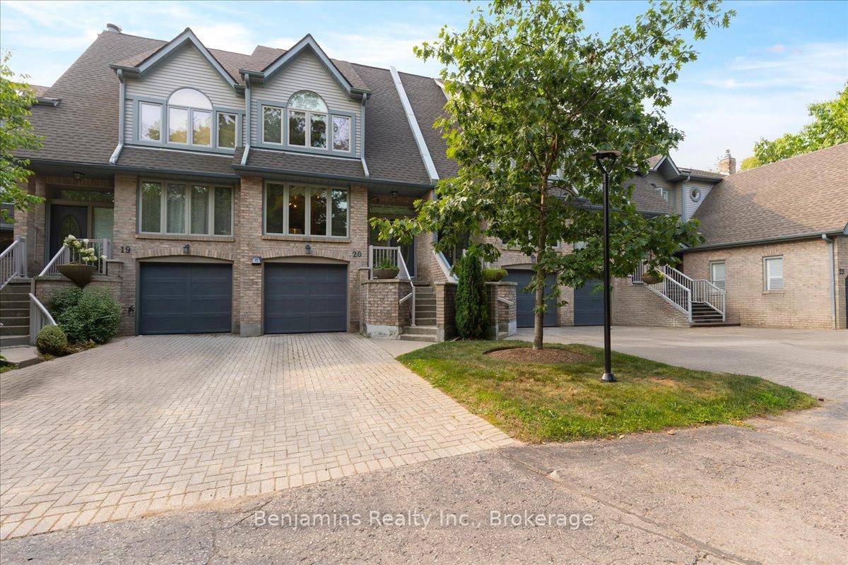 Welcome to 225 Benjamin Road, Unit 20, an exquisitely maintained townhome located in the highly desirable Treetops community in Waterloo.