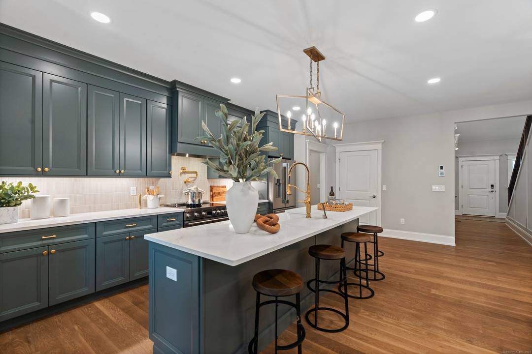 EG Home, a trusted multi award winning builder, introduces the Sawgrass home at Oxford Greens, Connecticut's premier active adult community.