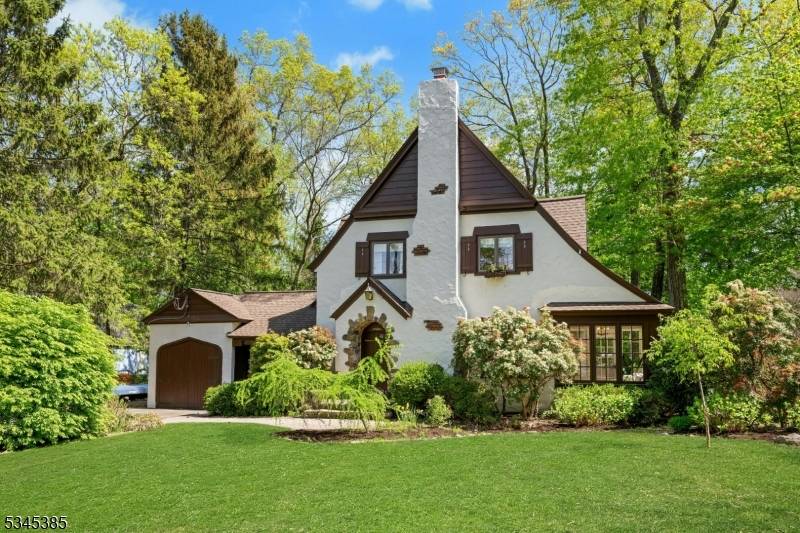 Start your next wonderful chapter in this enchanting storybook Tudor located on.
