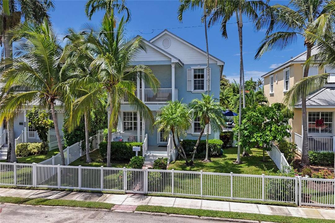 Epic curb appeal and resort style luxury come together in this extraordinary Key West style home in the heart of Hollywood Lakes.