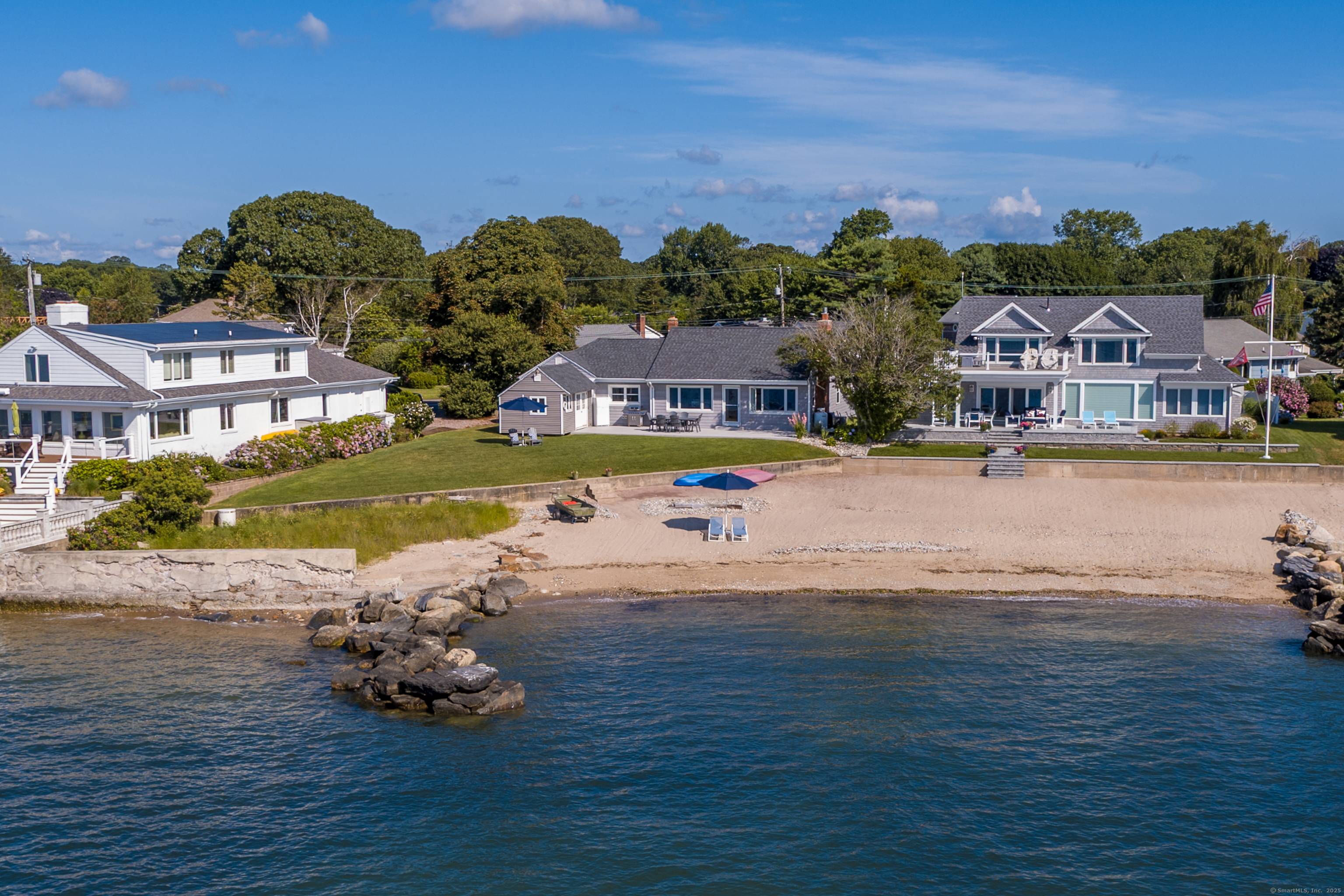 Embrace the pinnacle of coastal serenity in this captivating waterfront home, cradled by Old Saybrook's shores with a private beach, flanked by two protective break walls and a robust seawall, ...