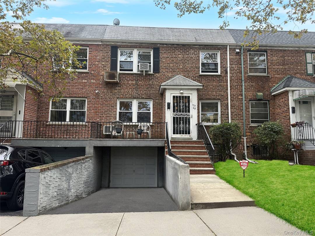 Enter this 2 family brick home located in the heart of Fresh Meadows.