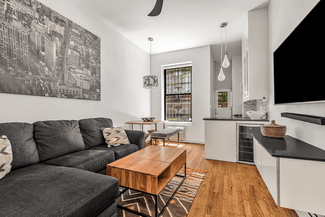 Welcome to an exceptionally charming and thoughtfully updated one bedroom home offering something almost unheard of in Manhattan a huge, fully equipped private backyard that feels like your own secret ...