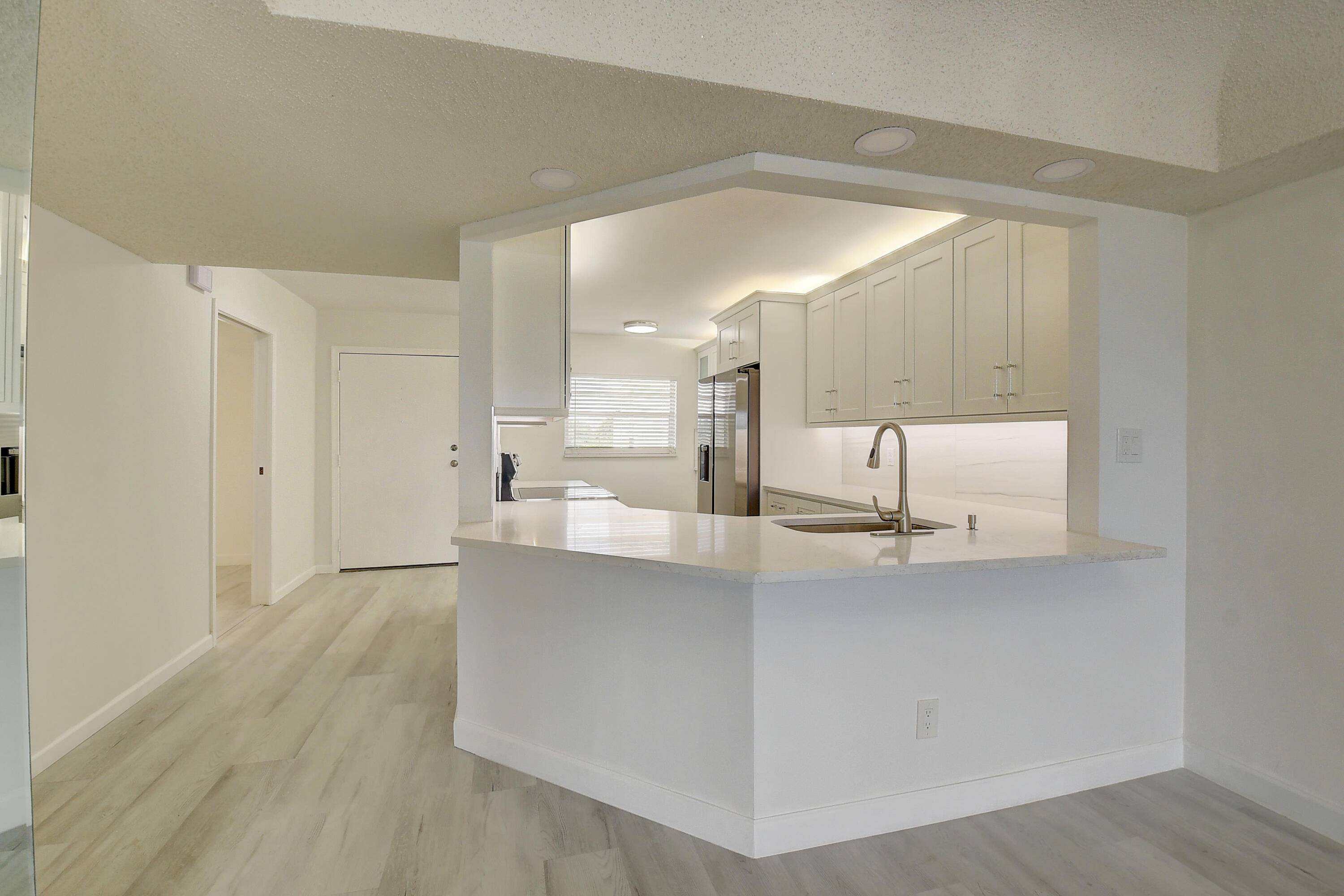 PRICED to SELL. Gorgeous views of Boca Dunes Golf Course.