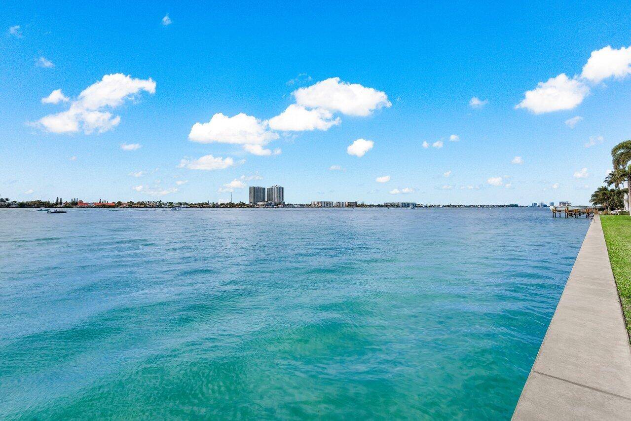Experience breathtaking wide Intracoastal views from 1025 Sugar Sands Blvd, Unit 162, a prime waterfront community on Singer Island !