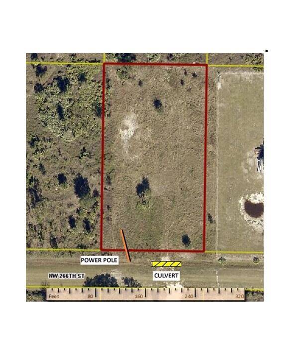 Viking Cleared 1. 25 acre lot with new culvert, power pole.