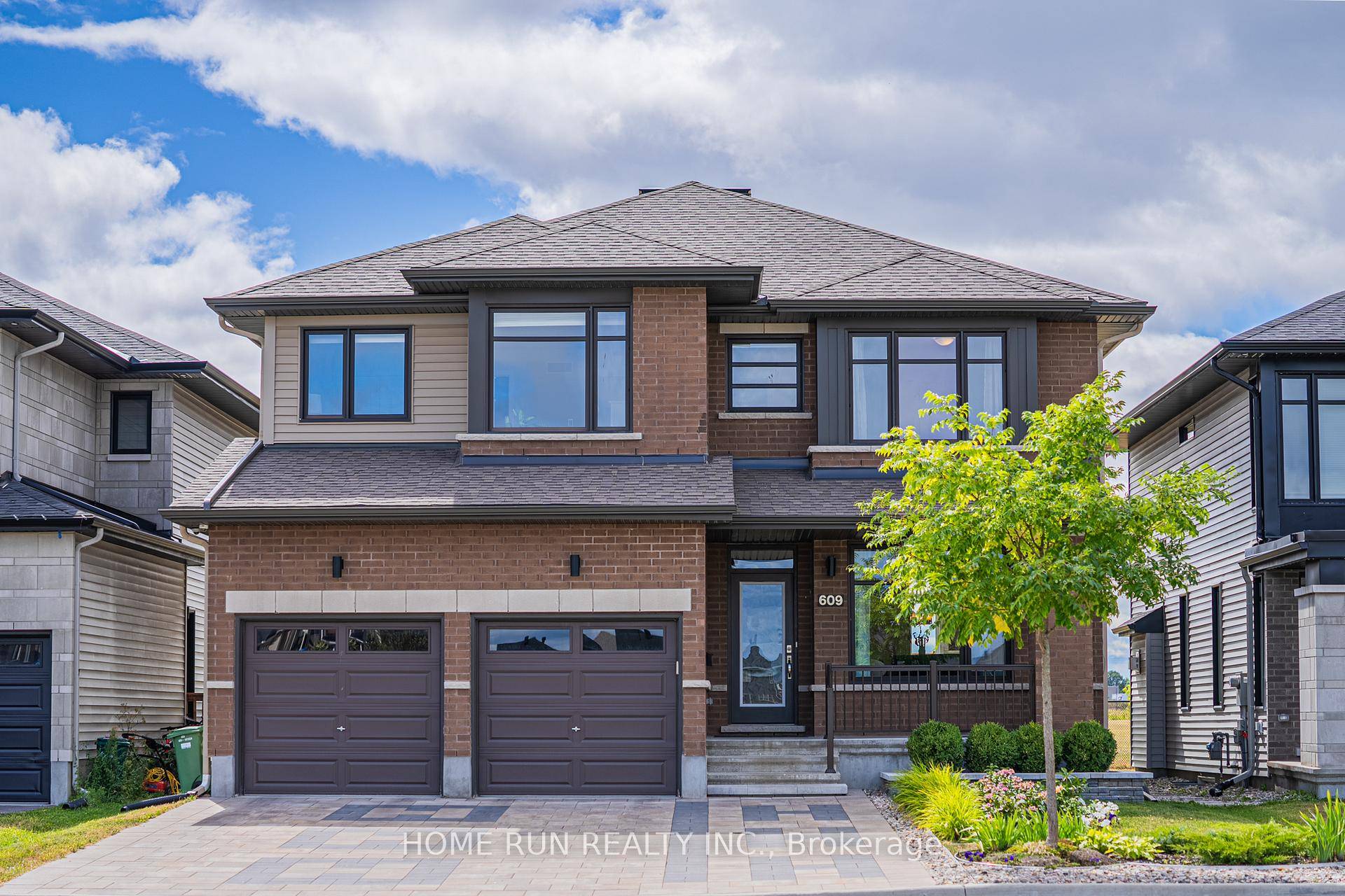 NO Rear Neighbors ! This stunning Millwood model, built by Richcraft Homes in 2020, offers 6 bedrooms and 5 full baths spread across three floors.