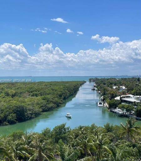 Spectacular Views ! ! ! Enjoy the Open Bay, Canal amp ; Park views from this bright 2 2 split plan residence with abundant natural light and breathtaking Sunsets !