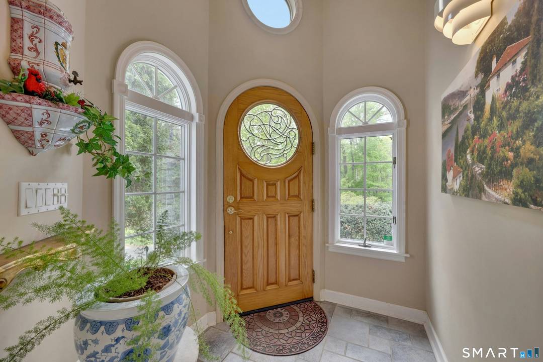 Privately nestled on 1. 76 exceptional acres in a coveted Westover setting, 450 Westover Road is a sophisticated retreat offering remarkable privacy, scale, and timeless appeal.