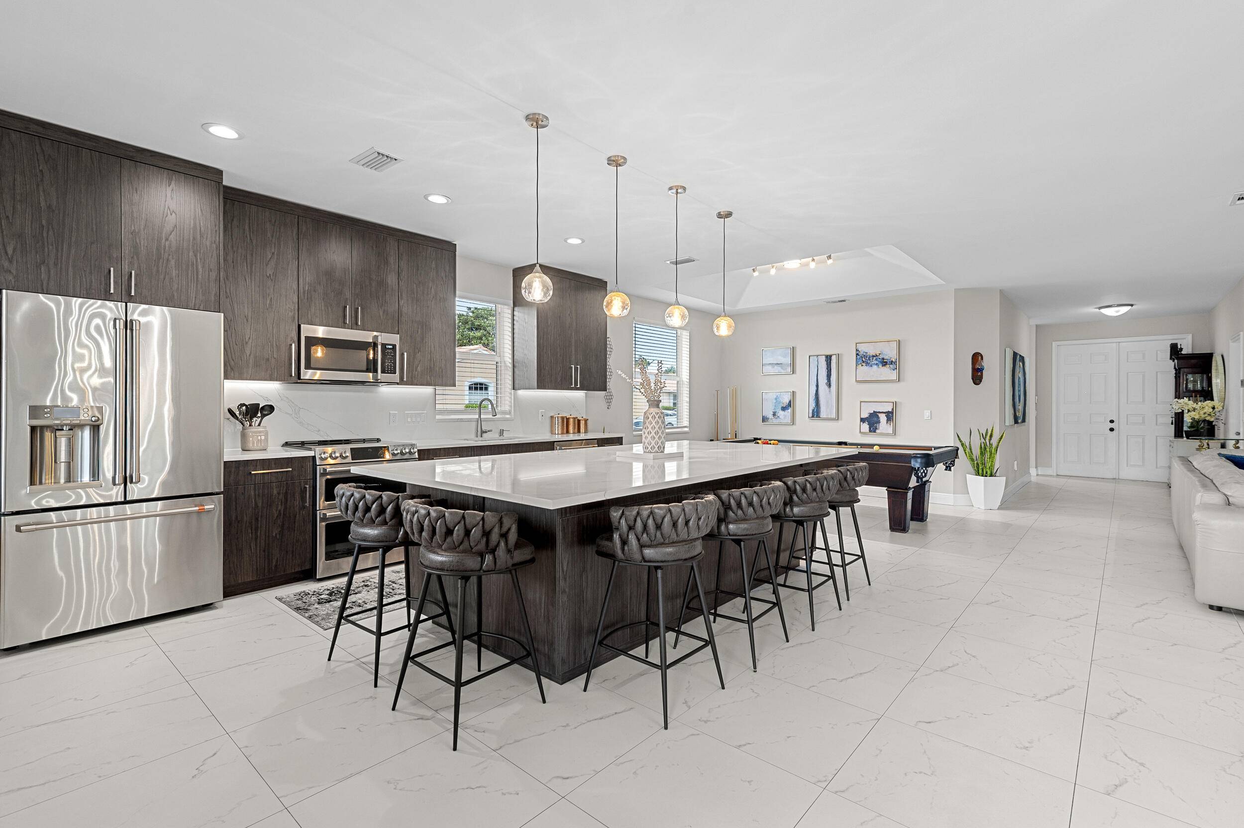 Discover this exceptionally updated single family home situated on a spacious corner lot with breathtaking lake views nestled in a private gated community.
