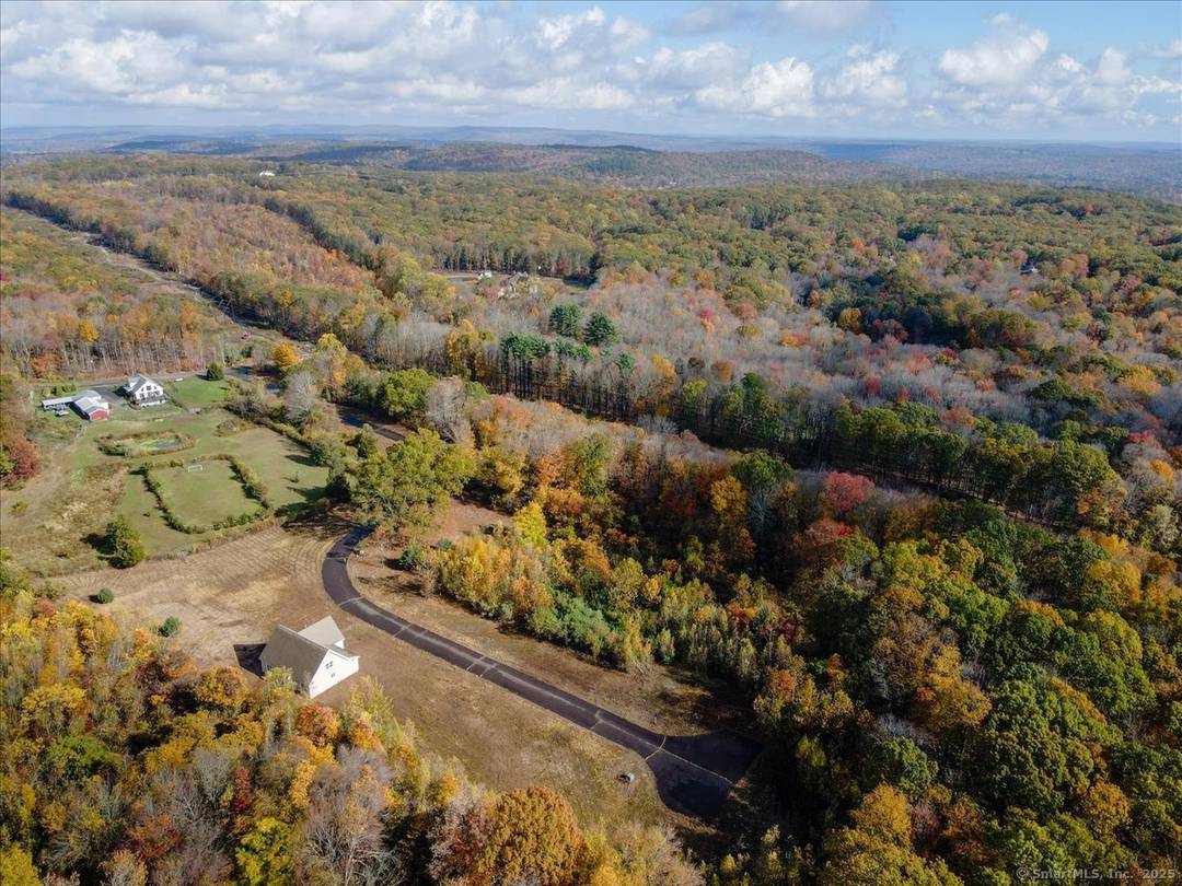 Welcome to a rare opportunity tucked away on over 10 serene, level acres already approved for an exclusive 8 lot subdivision designed for the 55 and older community.