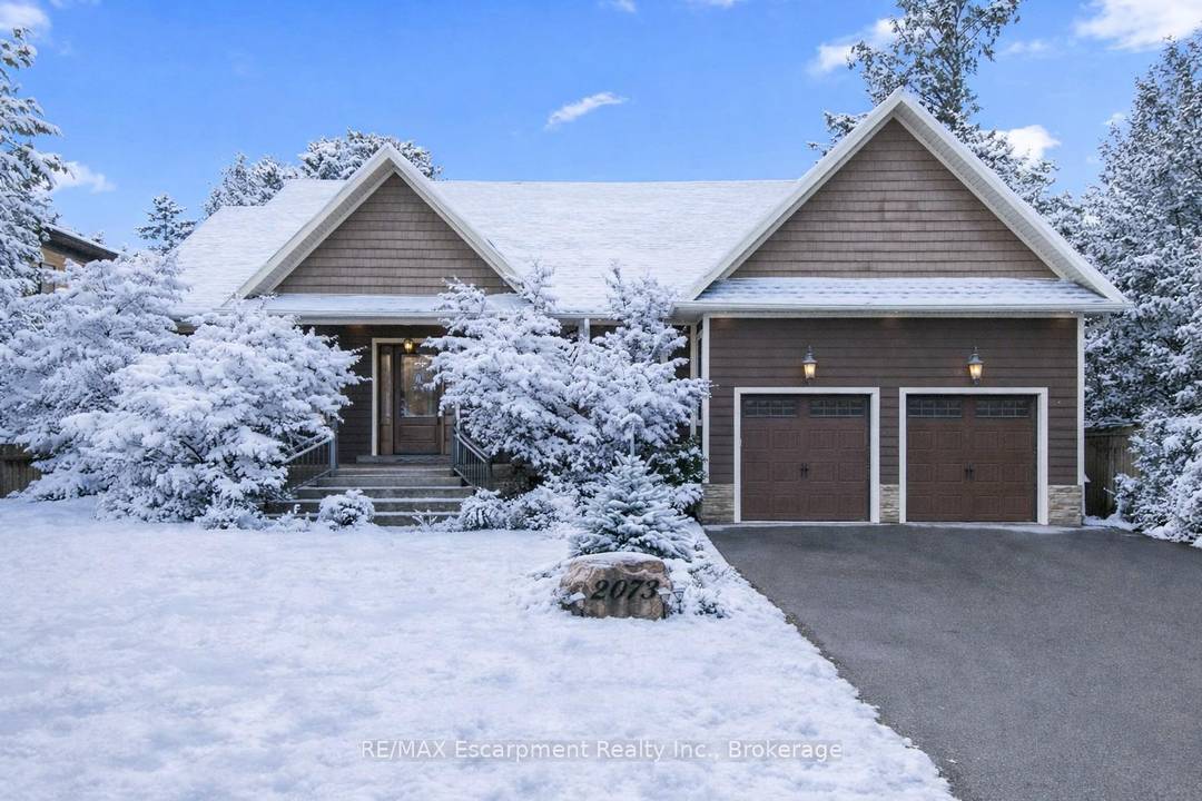 Tucked away in prestigious Southeast Oakville, this extraordinary custom built bungalow tells a story of timeless elegance and effortless family living.