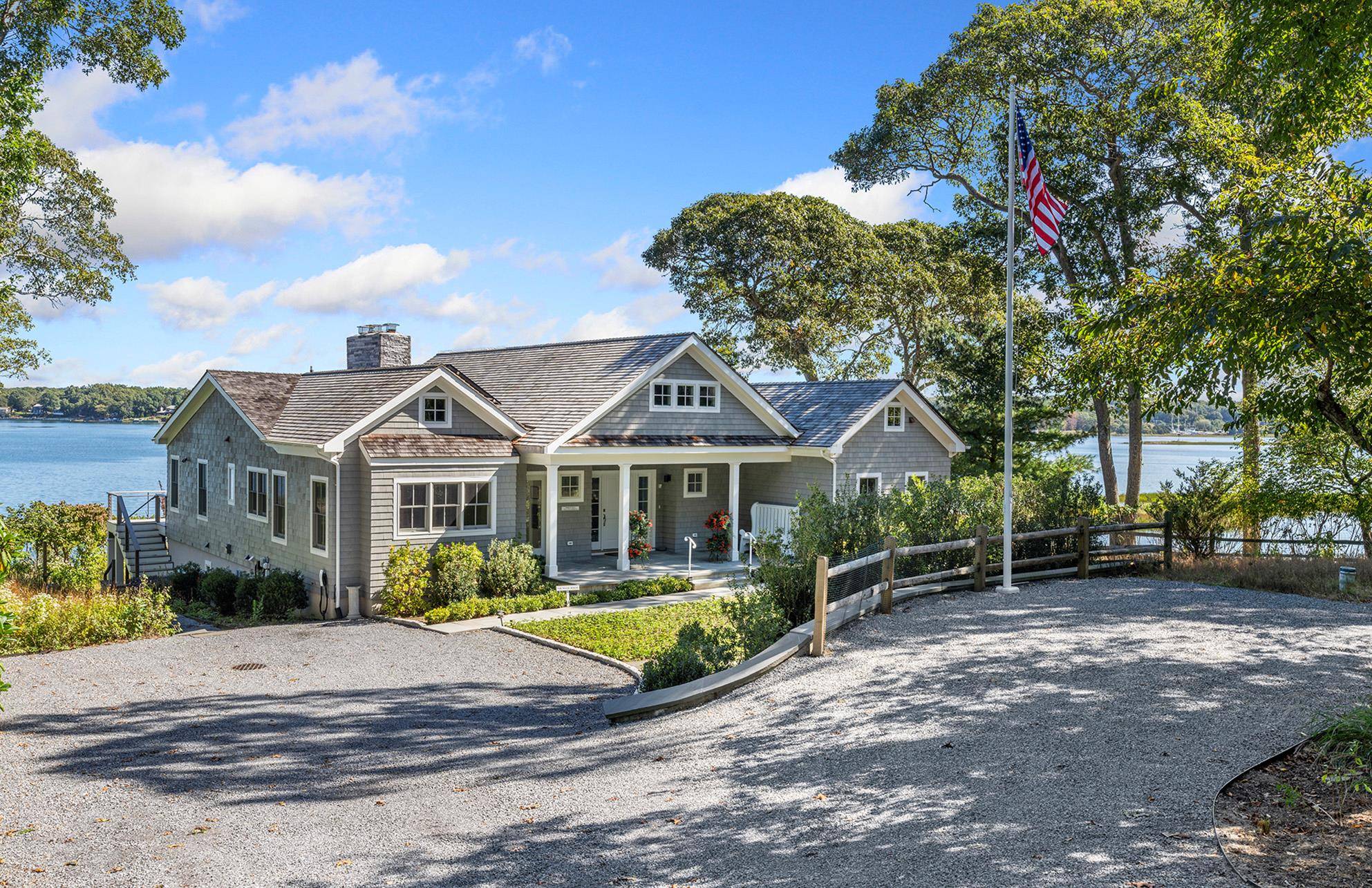 Facing due east with panoramic views and brilliant sunrises with 101' water frontage on Three Mile Harbor, this traditional house was thoroughly renovated in 2022.