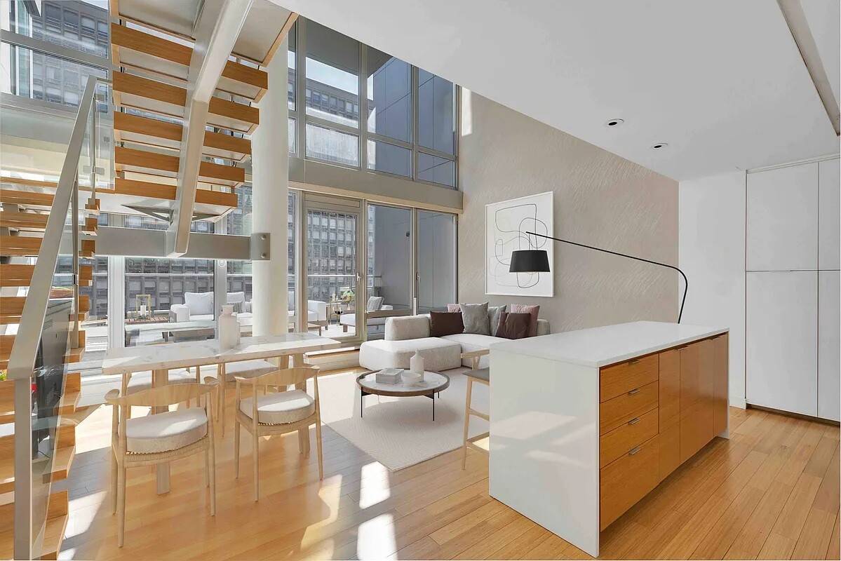Architecturally striking Duplex with split bedroom layout, double height ceiling and massive floor to ceiling windows that lead out to your own private terrace.