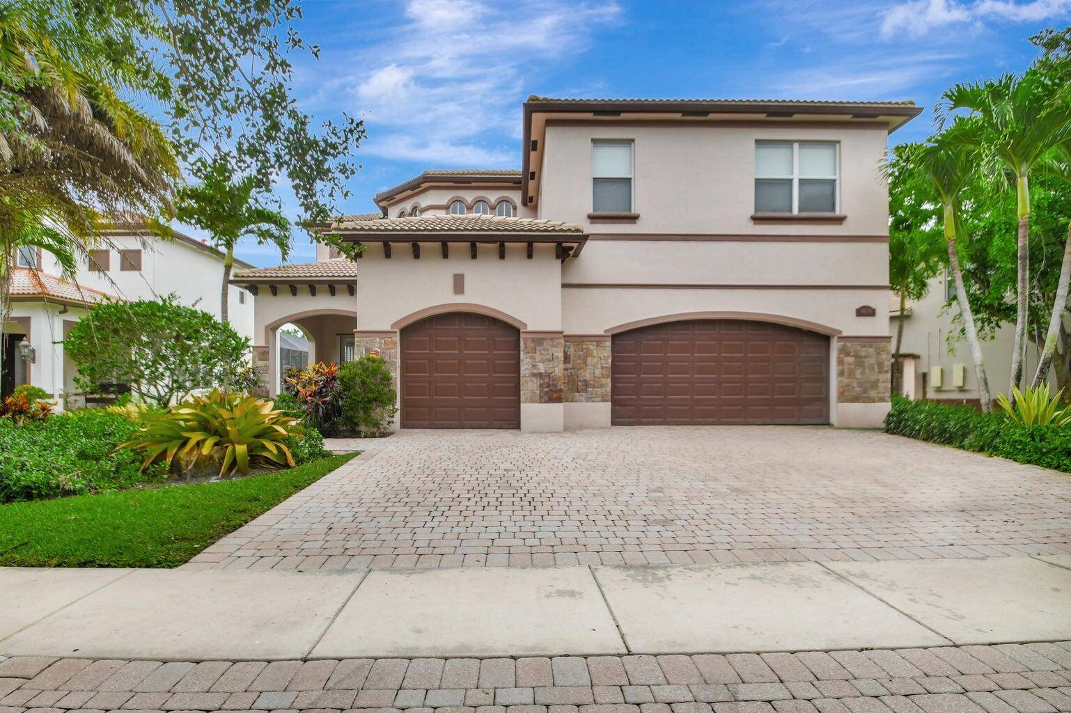 Stunning waterfront estate pool home boasting breathtaking lake views !