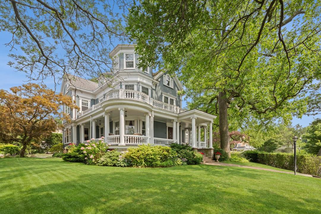 Welcome to 28 Shore Road A rare waterfront gem in the heart of historic Douglas Manor.