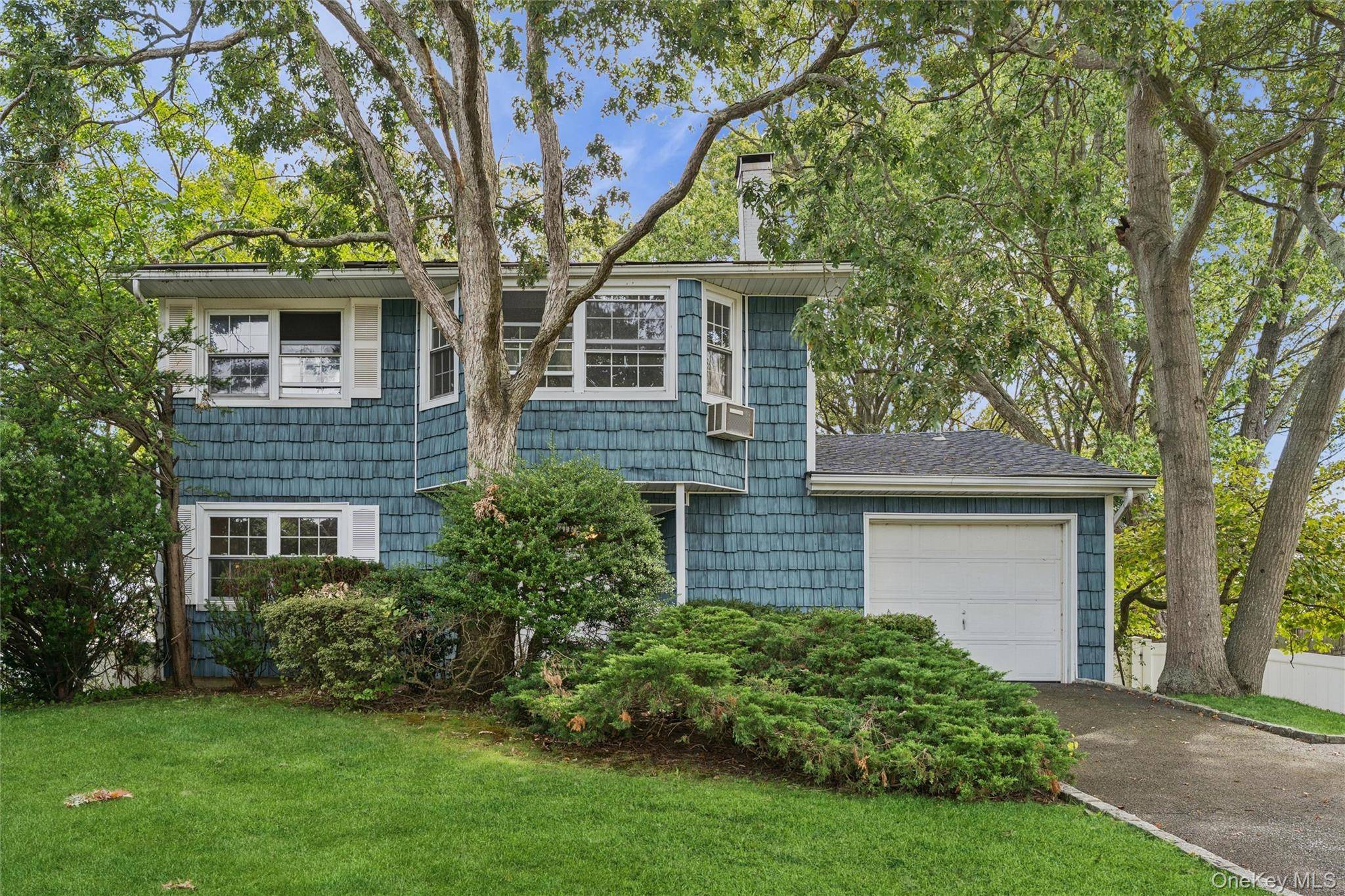 This traditional 4 bedroom colonial is set in a highly desirable neighborhood at the edge of a cul de sac, offers both comfort and curb appeal.