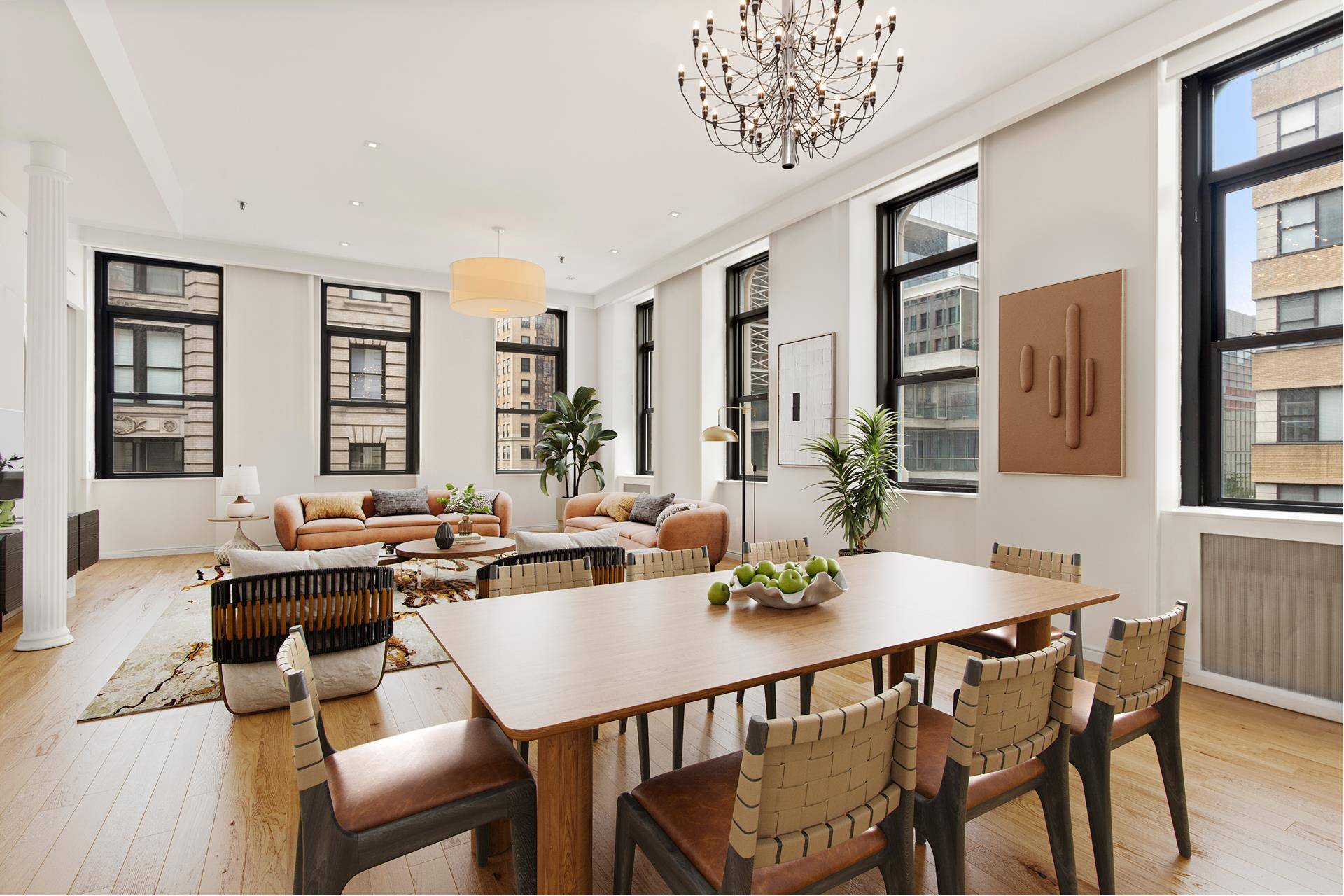 Rare sun flooded, full floor loft condominium with key locked elevator, 11 foot ceilings, and 11 oversize windows facing south and west, located in the Tribeca Historic District.