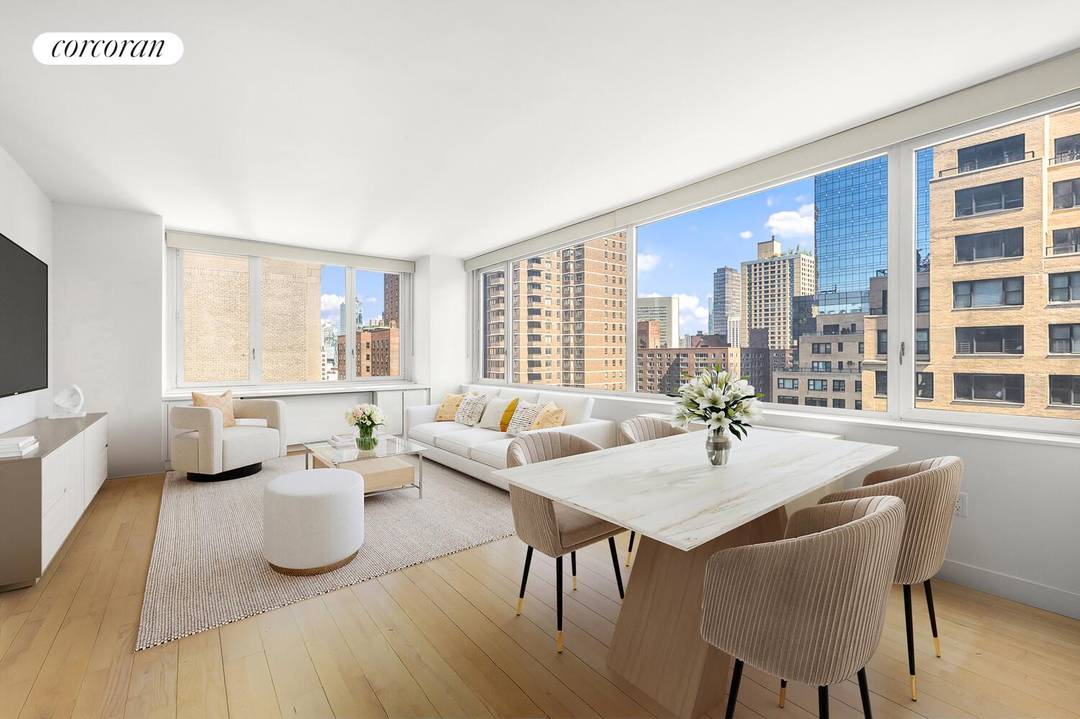 Residence 22G is a corner one bedroom at The Sheffield Condominium with an open layout and modern aesthetic.