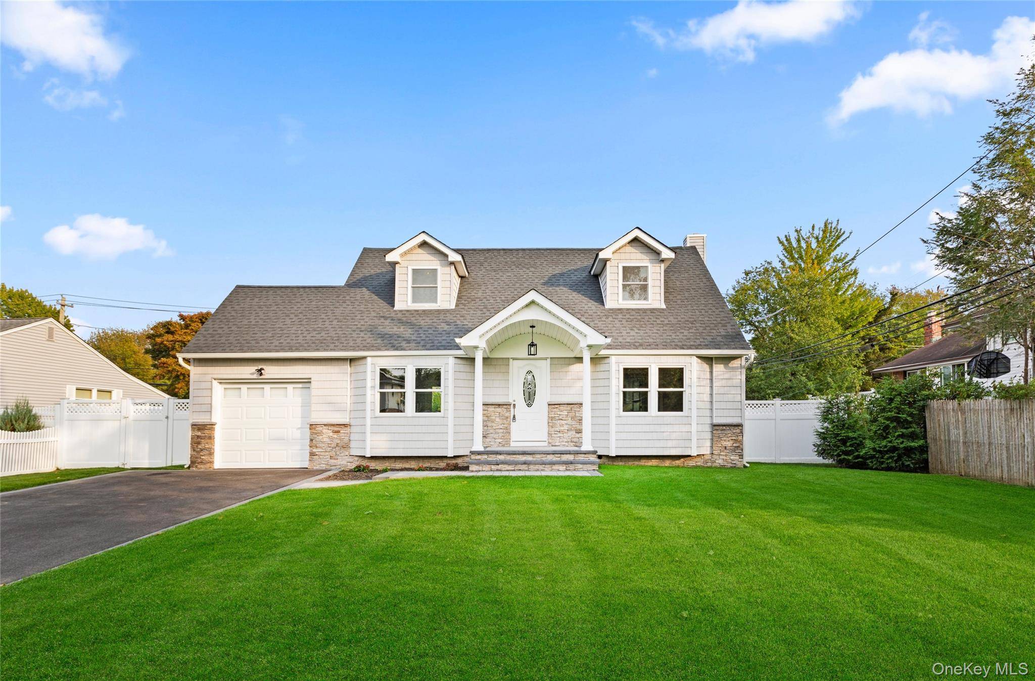 Welcome to 3 Ramsey Road, a LUXURIOUS Post Modern Expanded Cape that has been METICULOUSLY and COMPLETELY RENOVATED, from top to bottom, in the Mayfair Estates neighborhood of Commack.