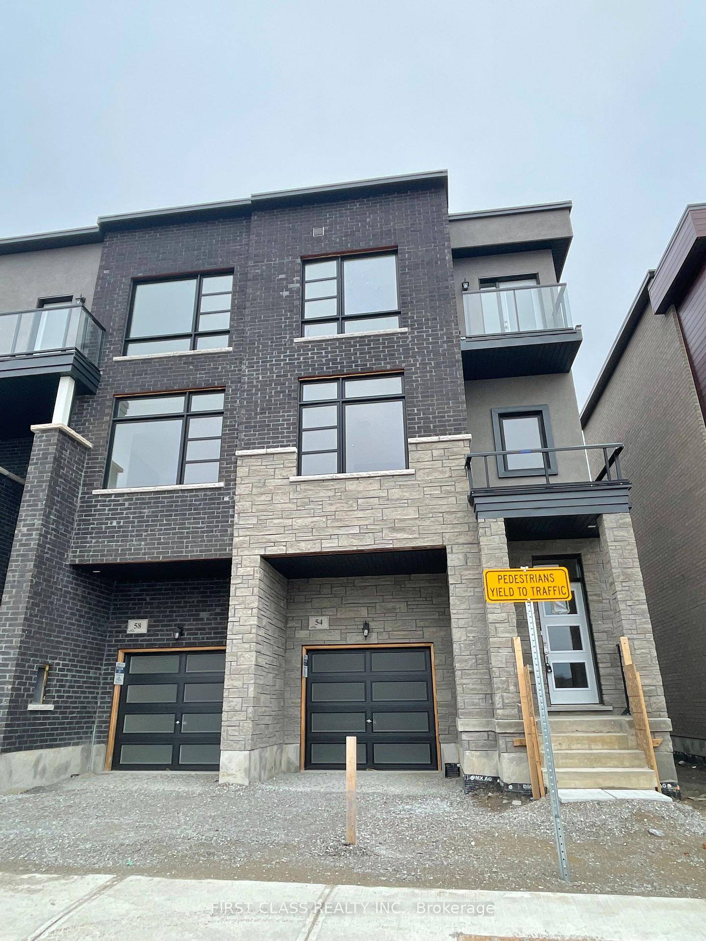 Luxurious and spacious end unit townhouse offering approximately 1, 998 sq.