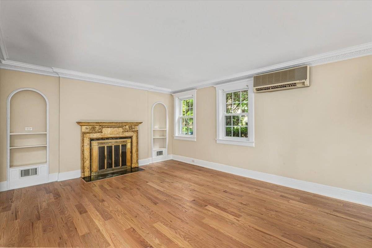 Heart of the Gardens, Detached Tudor Home, massive garden, two car garage, newly renovated bathrooms, new oak hardwood plank floors.