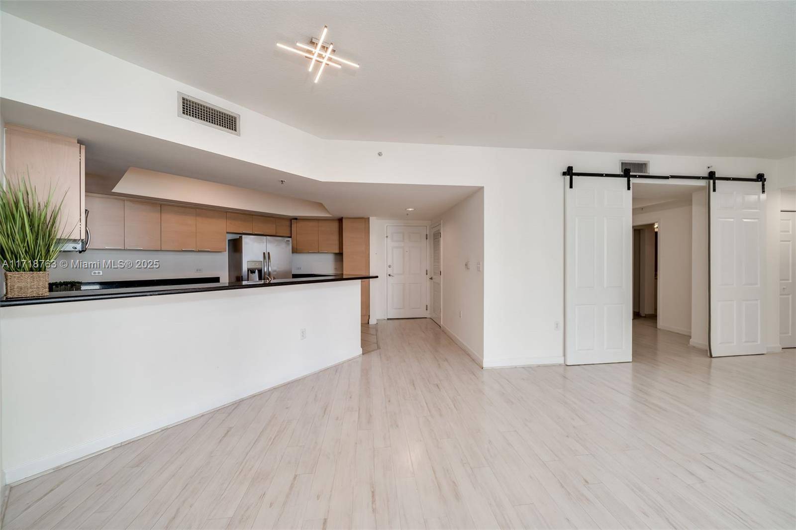 2 BEDROOM PLUS DEN with Jack and Jill bathroom door access from 2nd bedroom and den, spacious living, sleek laminate floors, upgraded lighting, large kitchen with lots of closet space, ...