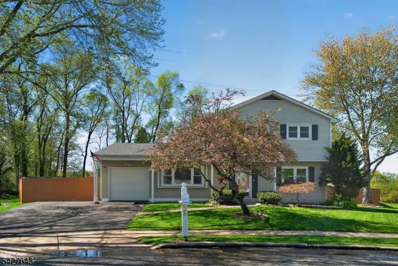 Live where you play ! This spacious 4 bedroom 2.