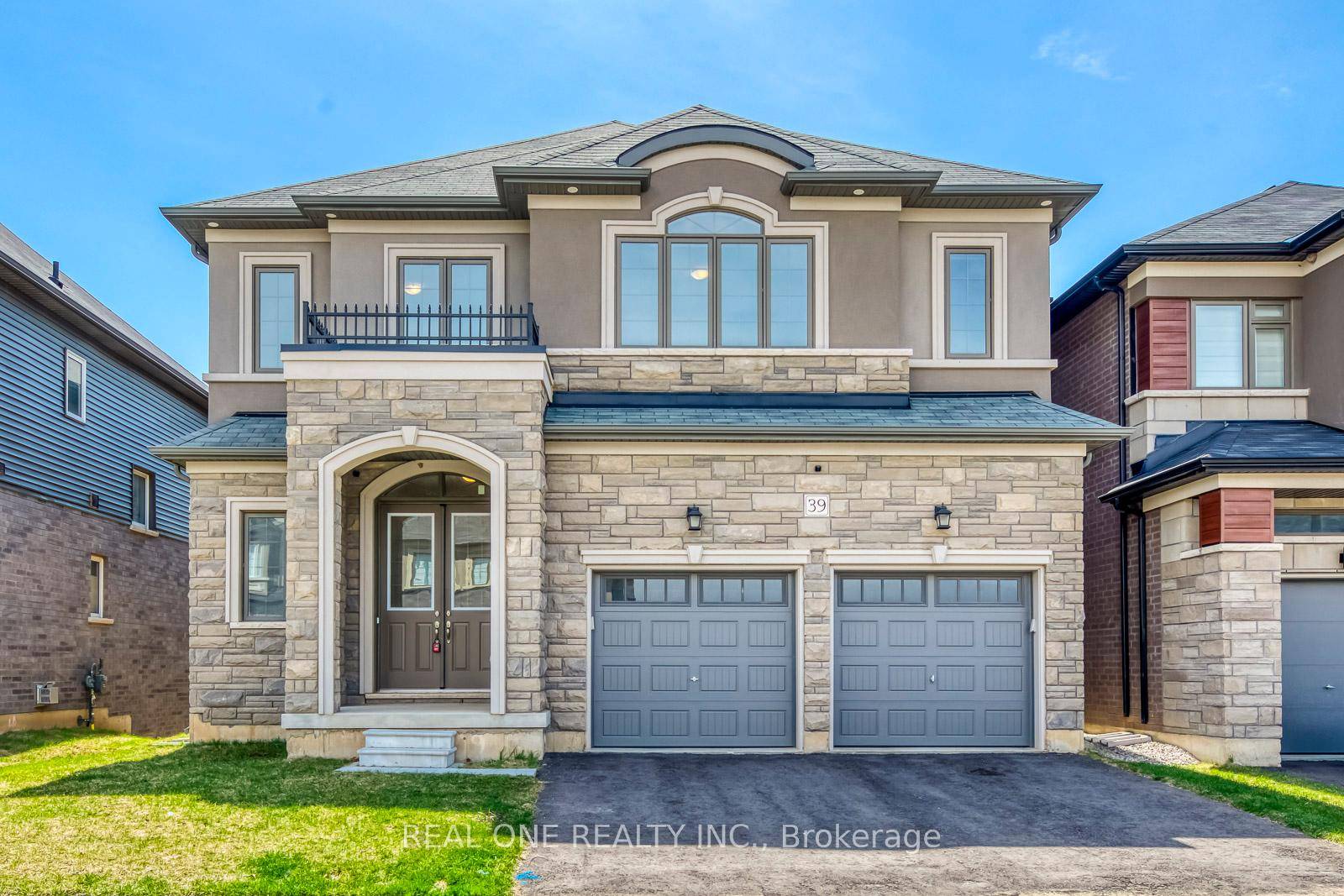 Elegant all brick 4 bedroom executive home on a premium ravine lot with walk out basement and tandem 3 car garage.
