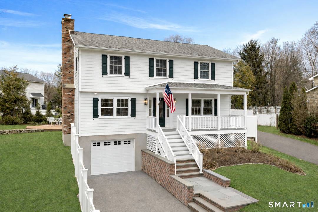 105 Rose Lane blends classic charm with modern updates in a welcoming Darien neighborhood.