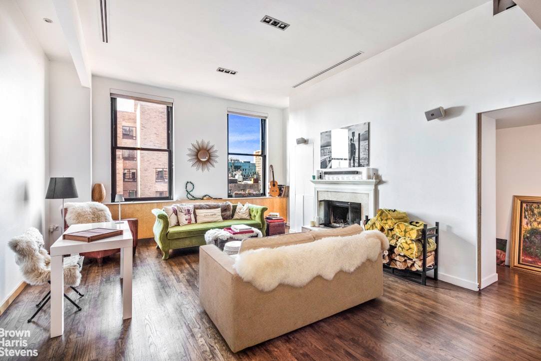 An incredibly rare and sexy penthouse duplex with a massive landscaped private roof deck sprawling out across nearly 2, 000 SF with sweeping, panoramic open city views in every direction.