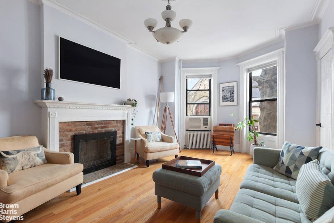 Classic Park Slope charm meets generous proportions in this floor through two bedroom plus home office residence, set on the second floor of an intimate boutique co op.