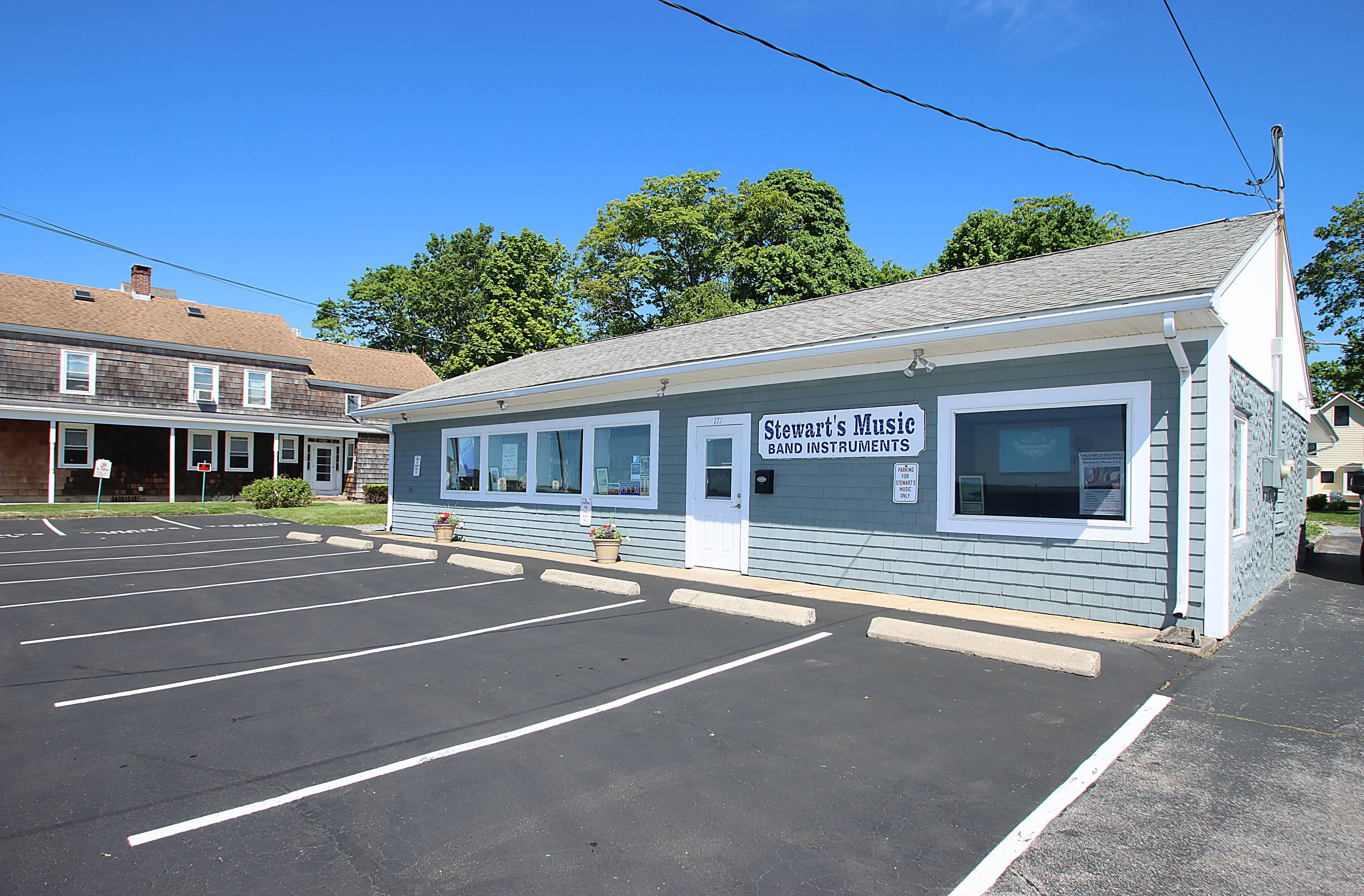 This is a rare opportunity to own a unique property in the heart of Niantic Village on Main Street, featuring both panoramic water views and on site parking.