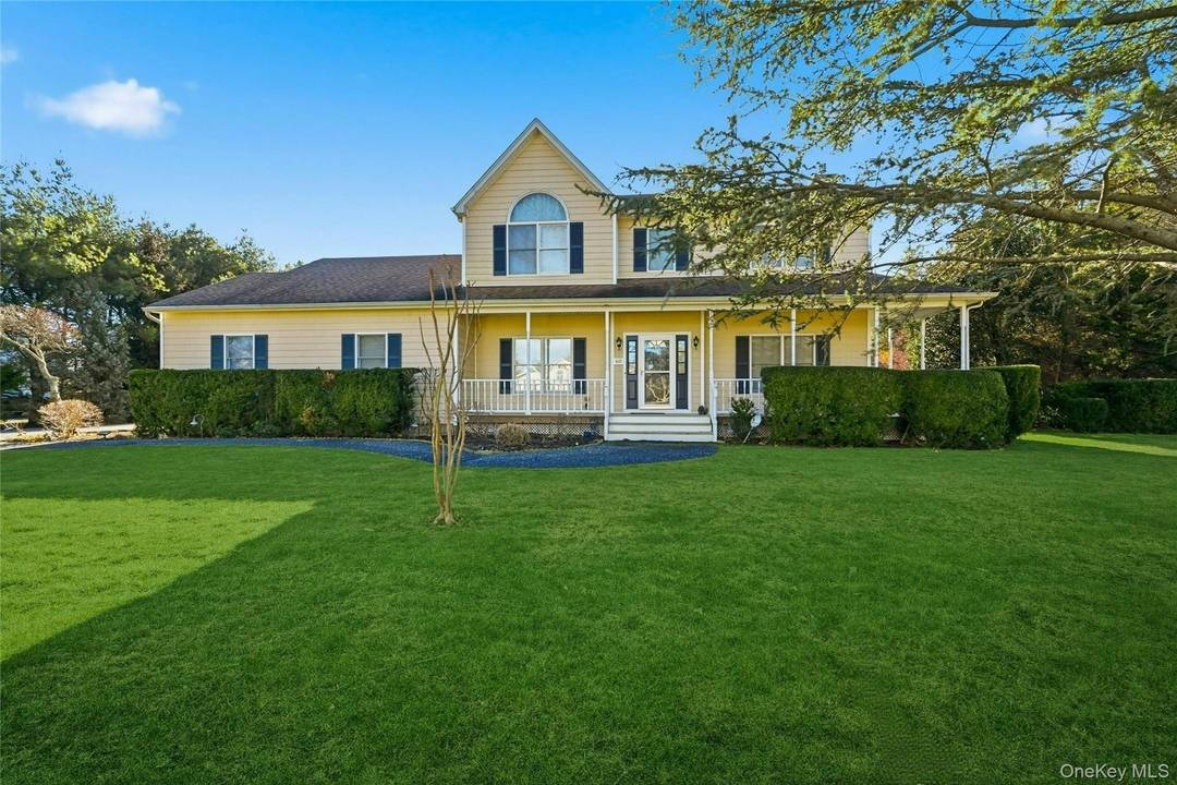 Settle into summer on the North Fork in this beautifully maintained and updated 4 bedroom, 3 full bath home located in the Angel Shores community of Southold.