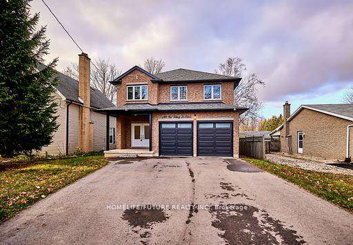 4 bedrooms and 4 bathrooms, 2544 SQF, Featuring a grand double door entry, 12 x 24 tiles, engineered hardwood, and natural oak stairs.