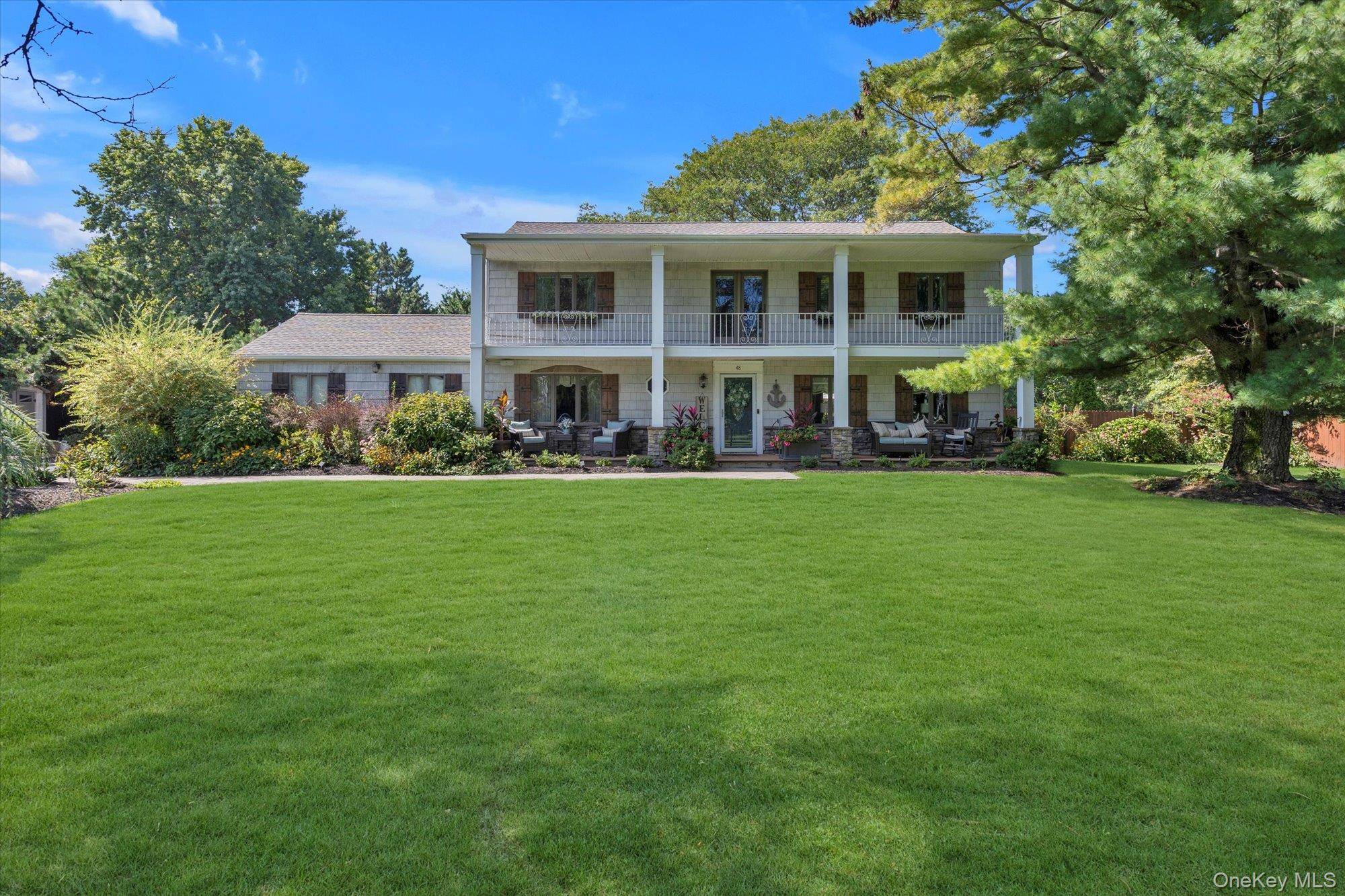 Stately colonial in Northport Bay Estates.