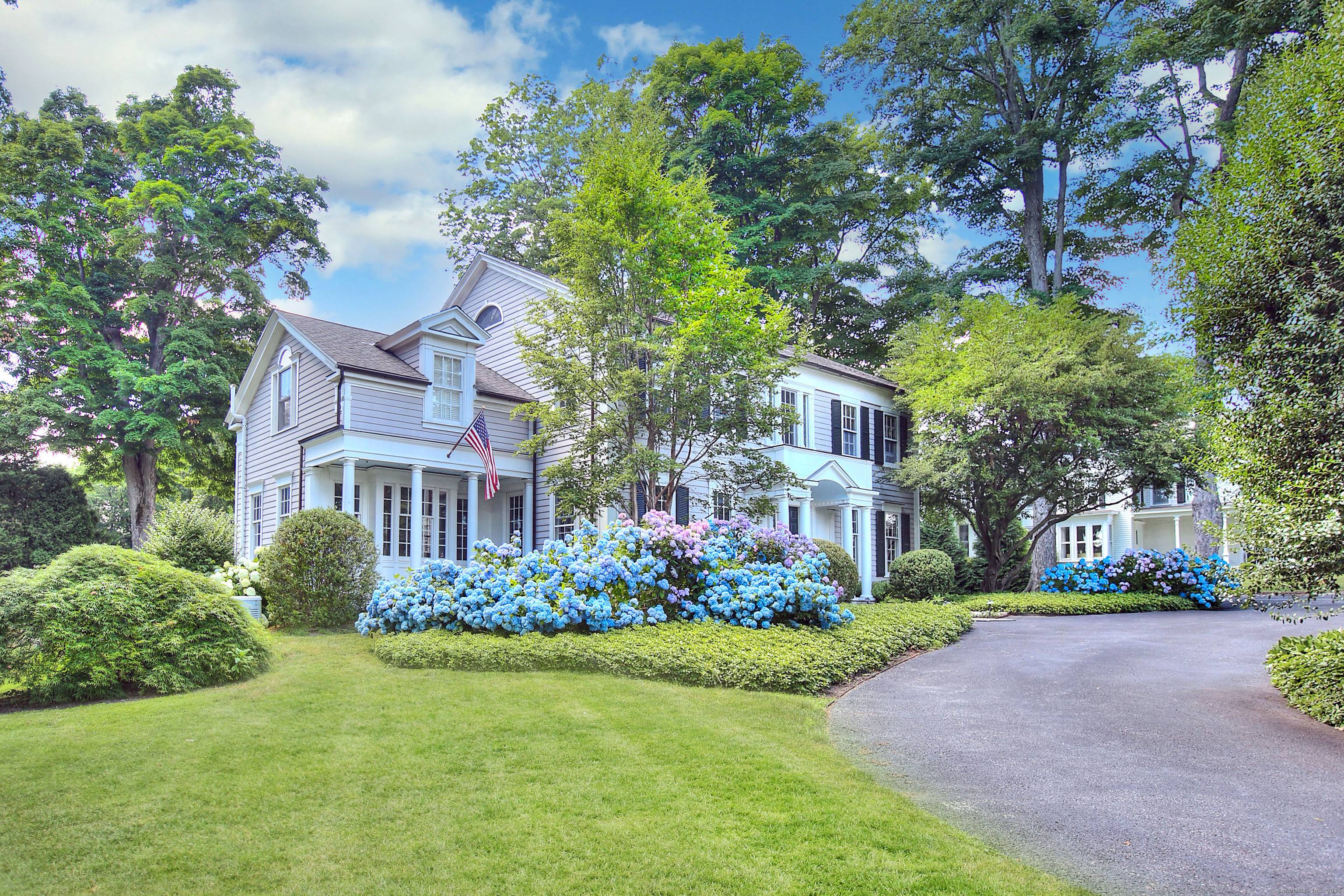 Located in the heart of Greenfield Hill at the top of Bronson Road, this iconic Connecticut estate sits on 2 beautifully landscaped acres with distant water views of Long Island ...