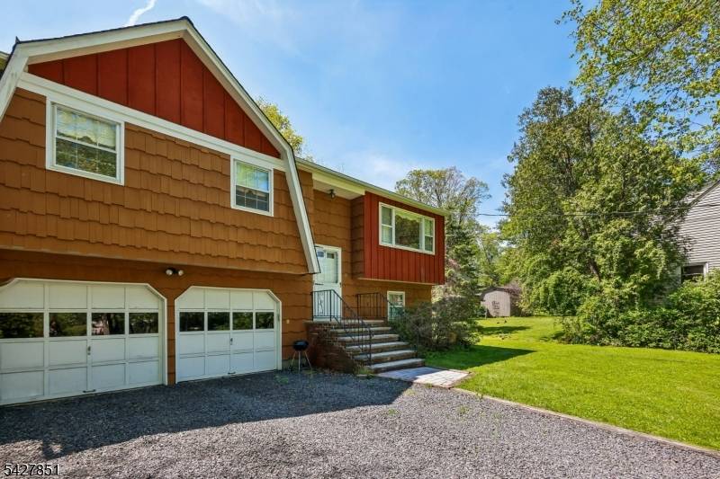 Spacious and well maintained split level home set on a beautiful, private property in desirable Warren Township.
