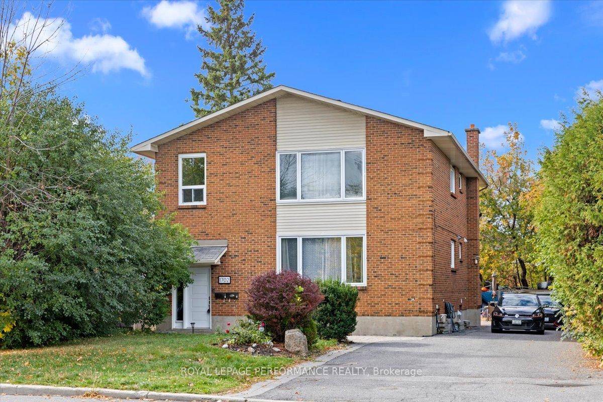 Purpose Built Brick Triplex in a Prime Location !