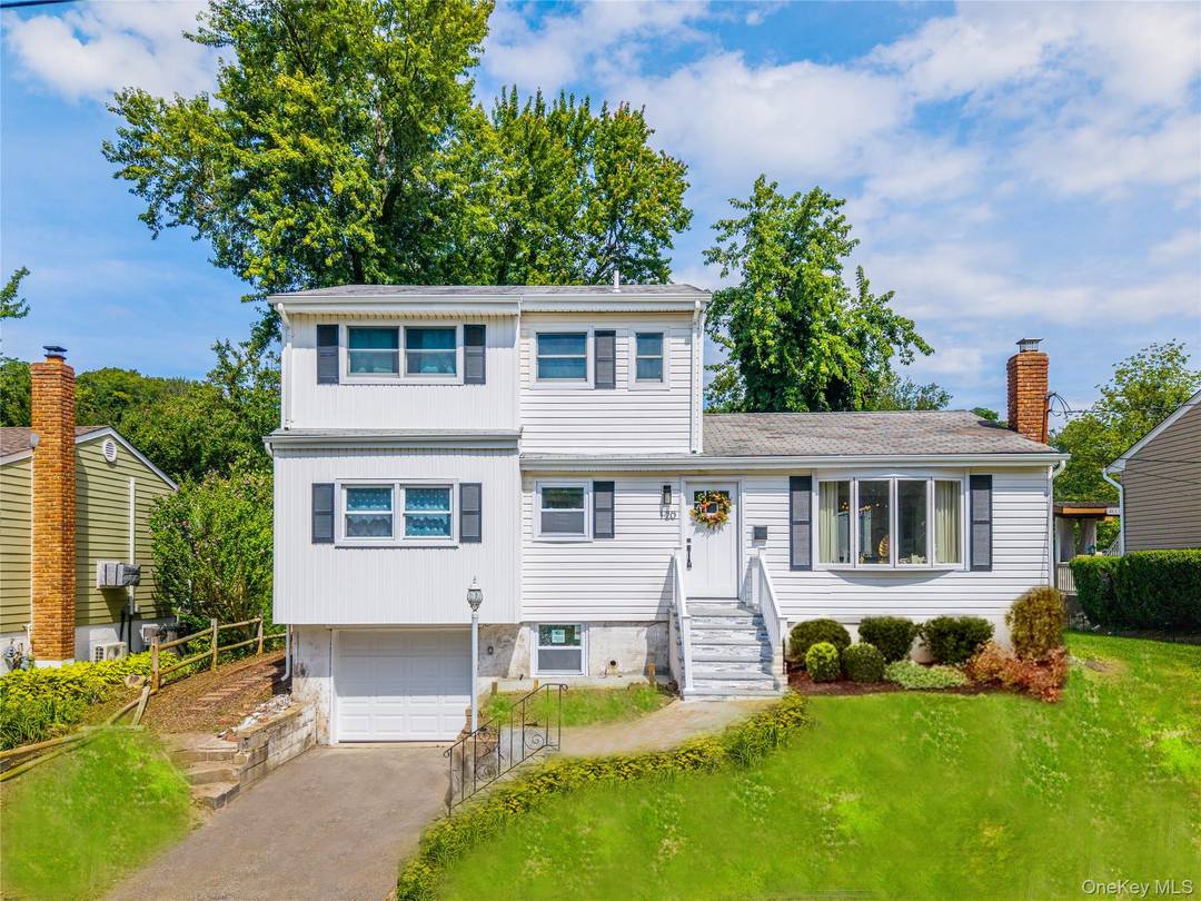 Newly renovated 5 bedroom, 2 bath Hi Ranch home in the North Shore School District.