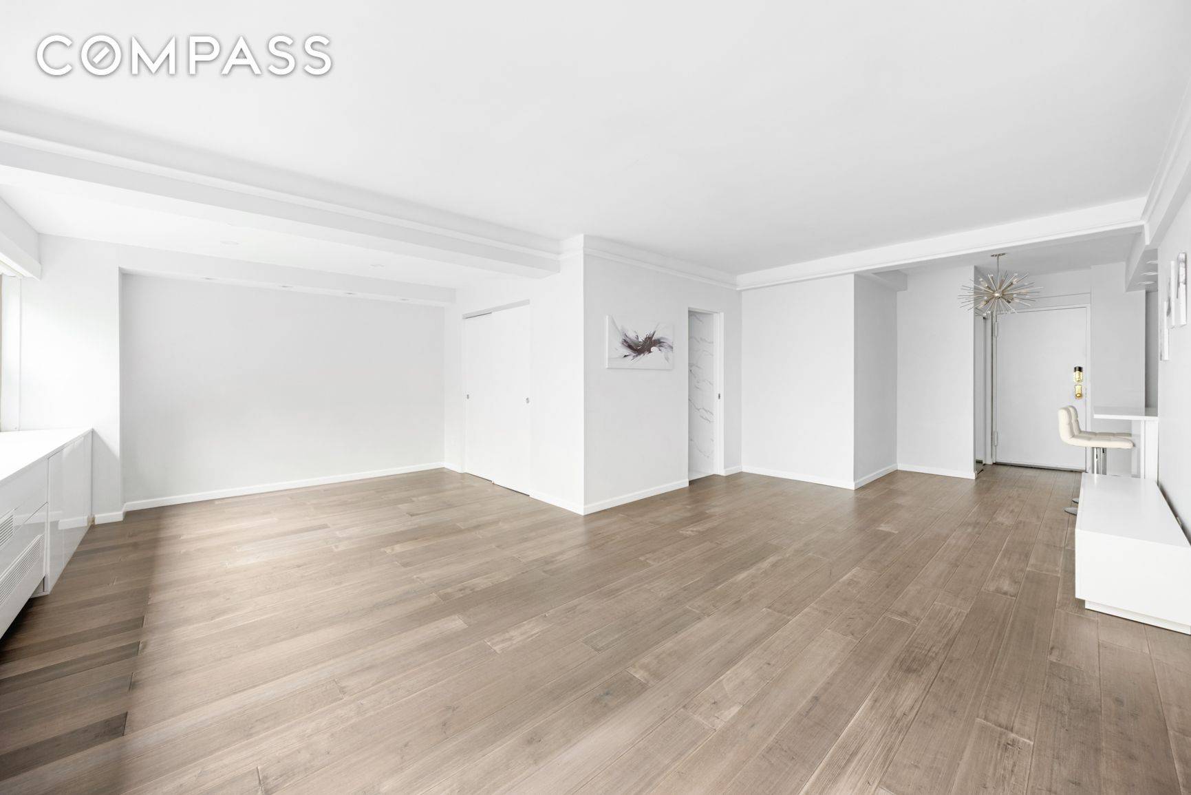 ALL OPEN HOUSES BY APPOINTMENT ONLY Welcome home to this meticulously renovated oversized alcove studio offering unparalleled comfort and style, complete with breathtaking open views of Dag Hammarskjo ld Plaza.