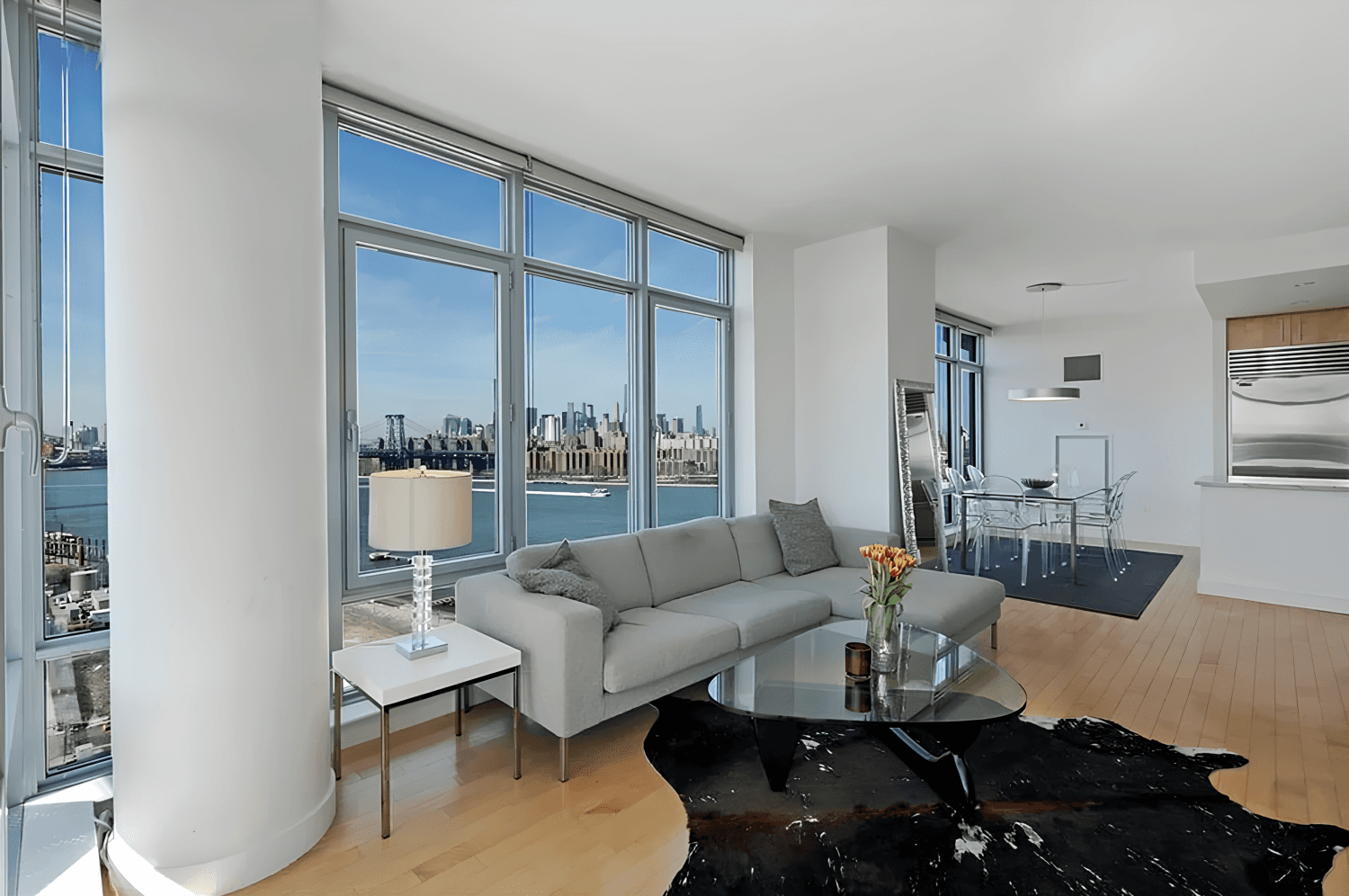 City and river views from this sunbathed condo with a large balcony at Northside Piers !