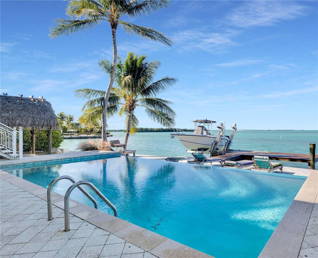 Welcome to 166 Bayview Drive, a rare bayfront estate in the prestigious Safety Harbor neighborhood of Lower Matecumbe Key.