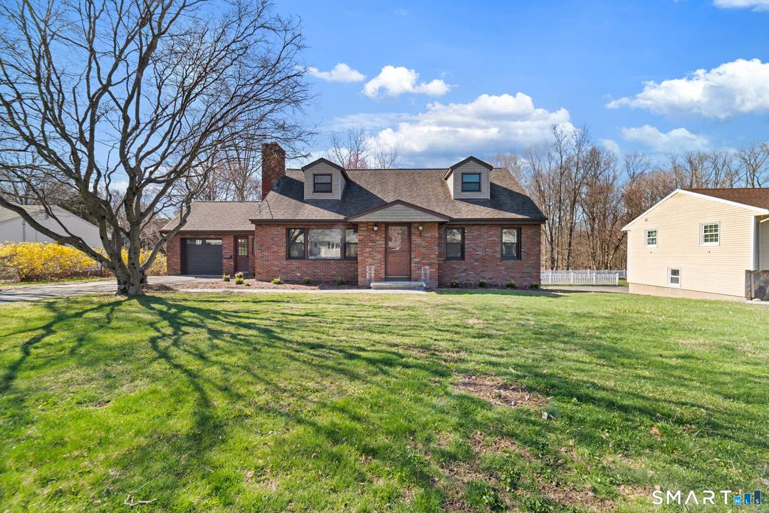 Exceptional fully renovated brick home available for rent on a peaceful, highly desirable residential street.