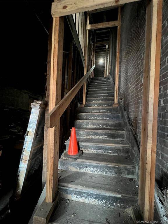 Four story, 11, 656 SF commercial building in the heart of downtown gutted and ready for buildout.